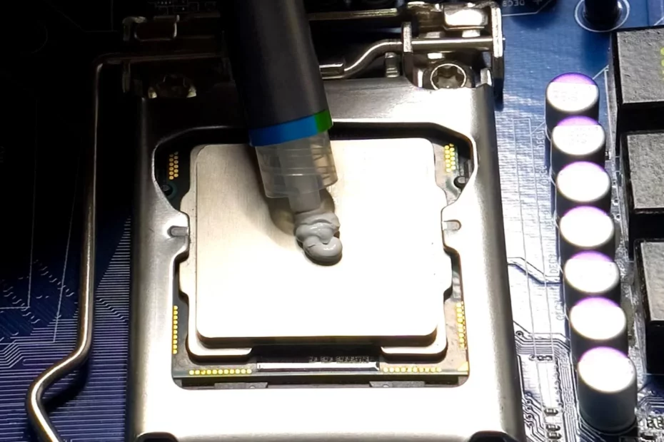 Close up of thermal paste being applied to a processor