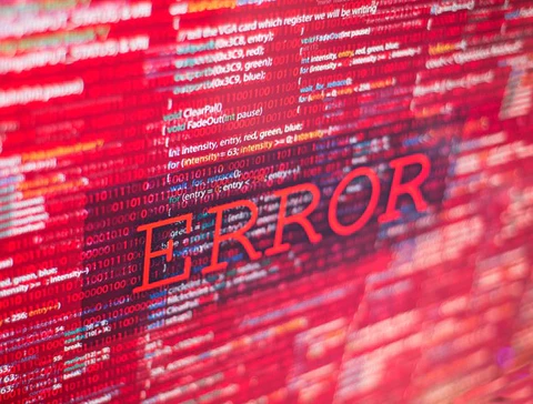 Error message in red text overlaid on programming code background
